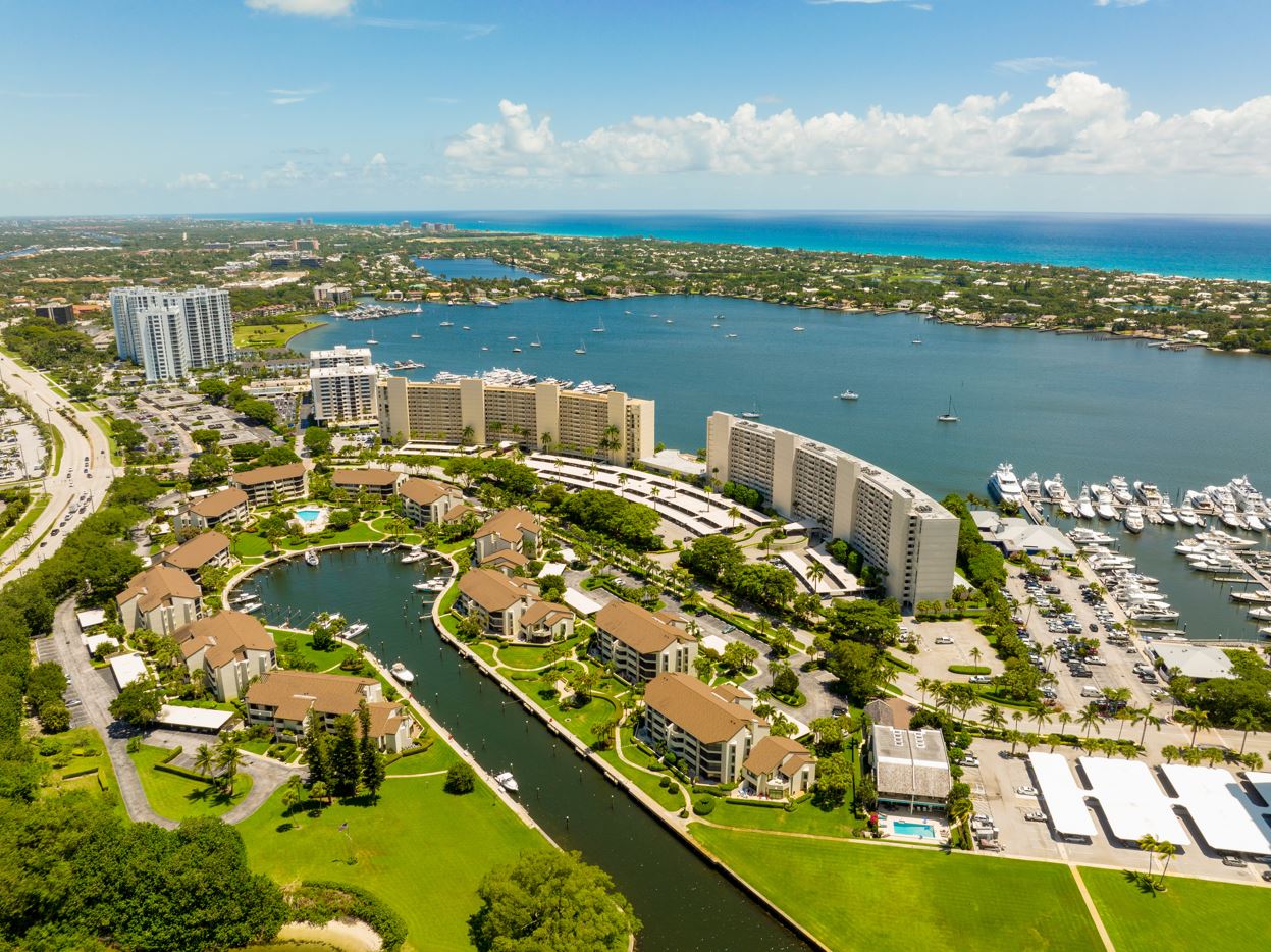 Aerial view of Fort Lauderdale's marina and waterfront, showcasing boats and the vibrant coastal landscape.