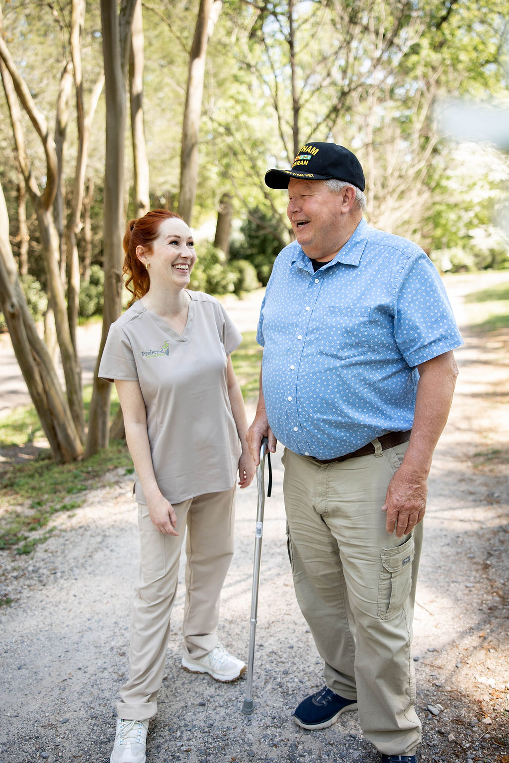 A caregiver and senior woman spending time together at home