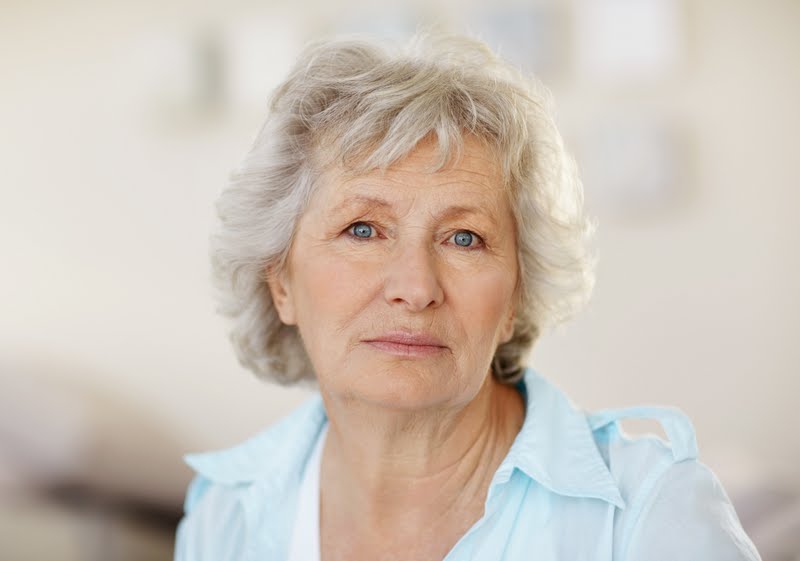 senior woman looking sad