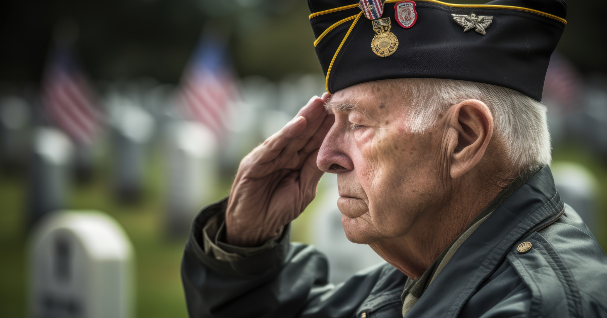 veteran saluting his fallen soldiers for memorial day.