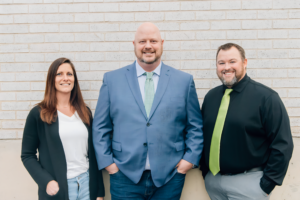 Krysti Kneiss, Ashley Grohs, and Adam LeRoux, the proud owners of Preferred Care at Home of Hernando, Florida.